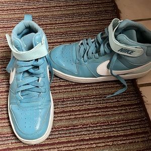 Nike mid high top sneakers women’s size 7, kids size 5.5